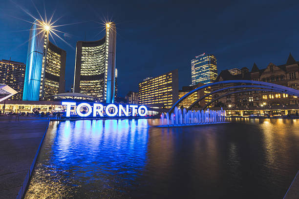 Nathan Phillips square in Toronto at night stock photo