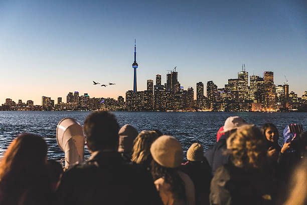Tourists on a ferry boat in Toronto stock photo