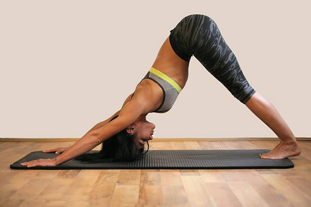 istock Woman in yoga posture 626427070