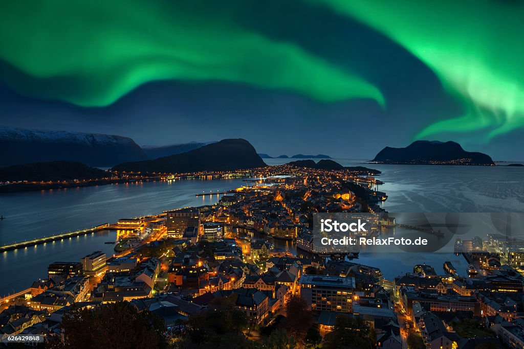 Northern lights - Green Aurora borealis over Alesund, Norway Green Aurora borealis over Alesund, Norway.  Norway Stock Photo