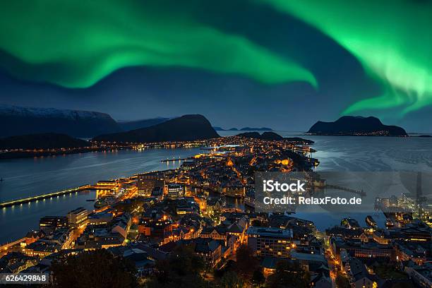 Northern Lights Green Aurora Borealis Over Alesund Norway Stock Photo - Download Image Now