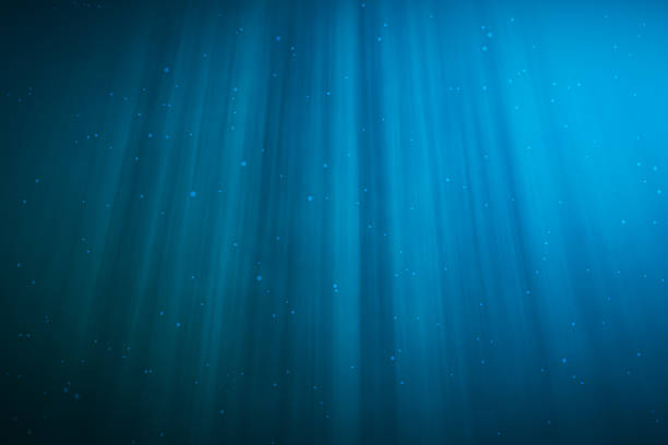 istock rendering underwater with sunrays and in deep tropical sea. 626435994