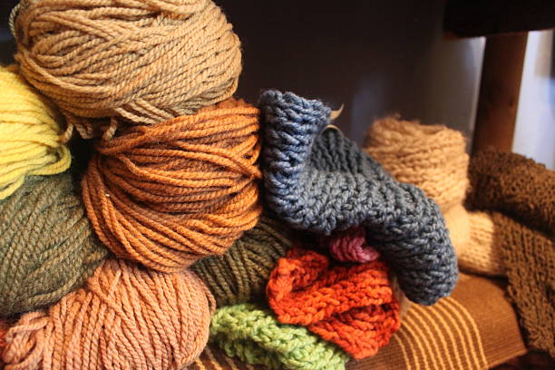 istock Hand spun and naturally dyed yarn on a shelf. 626446050