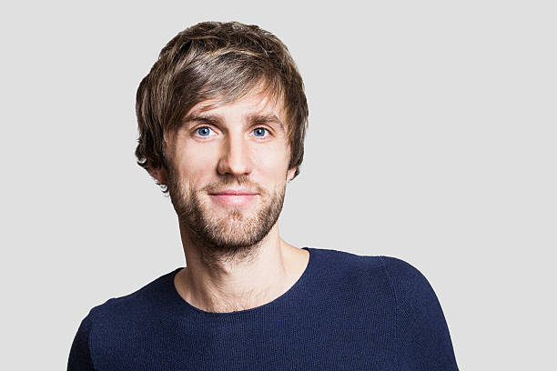 istock Cheerful smiling young man portrait 626447168