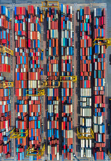 istock container ship in import export and business logistic.By crane , 626447192