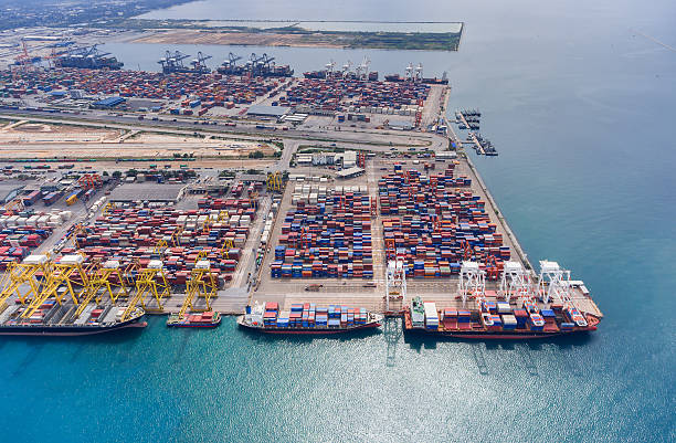 istock container ship in import export and business logistic.By crane , 626455236