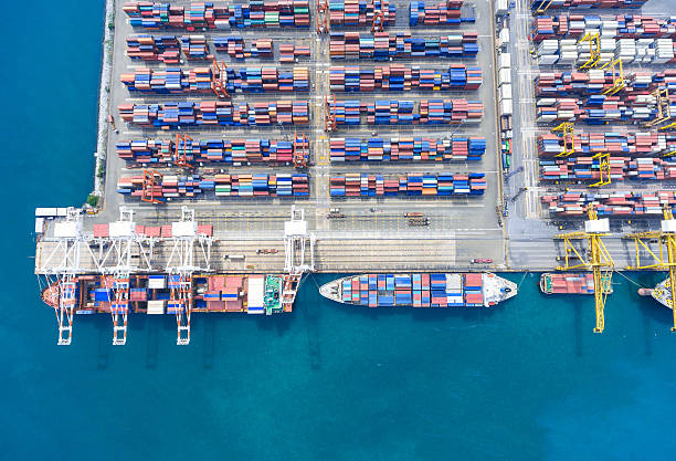 istock container ship in import export and business logistic.By crane , 626456004
