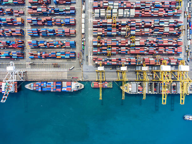 istock container ship in import export and business logistic.By crane , 626456396