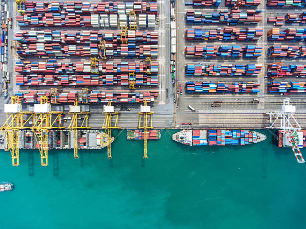 istock container ship in import export and business logistic.By crane , 626456564