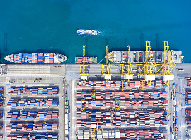 istock container ship in import export and business logistic.By crane , 626457482