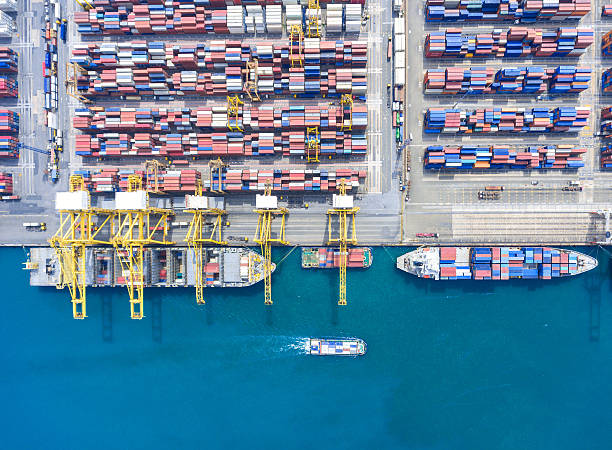 istock container ship in import export and business logistic.By crane , 626457712