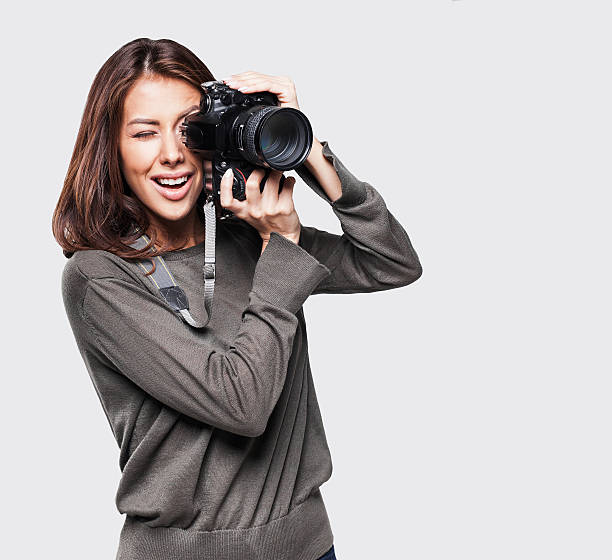 Woman photographer with camera