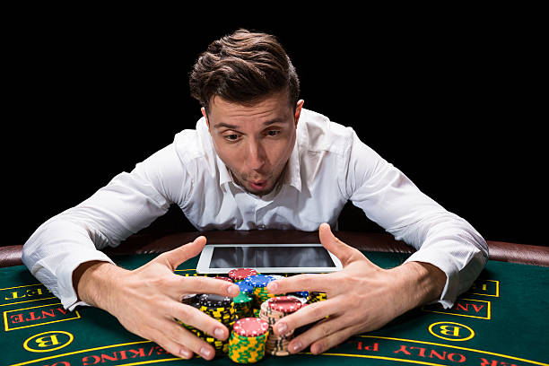istock happy player online poker 626461410