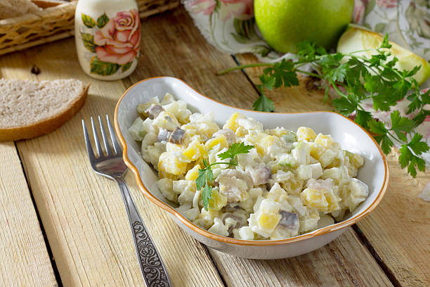 istock Salad with herring, eggs, apples and potatoes. 626462926