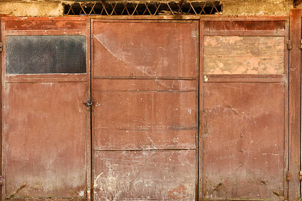 istock Grunge metallic brown garage door 626463558