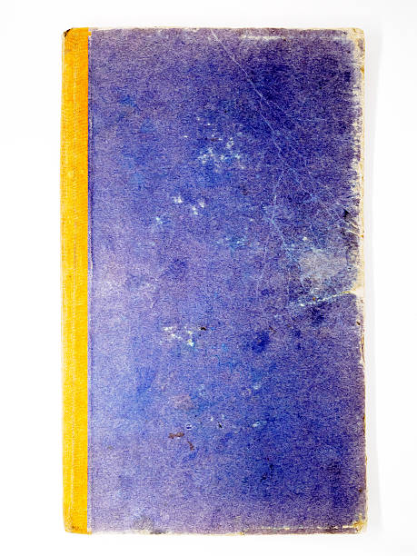 istock Blue old and dirty hard cover book isolated 626463656