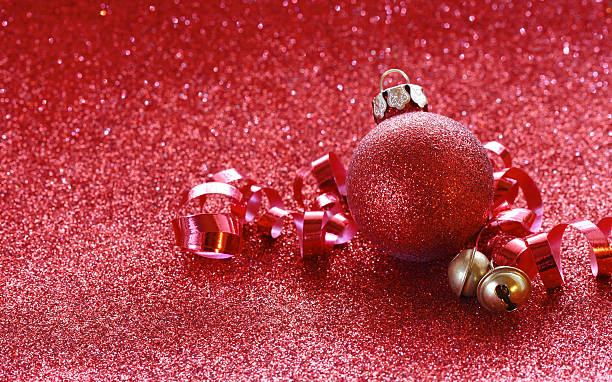 istock Red christmas glitter background, ball, jingle bells 626466038