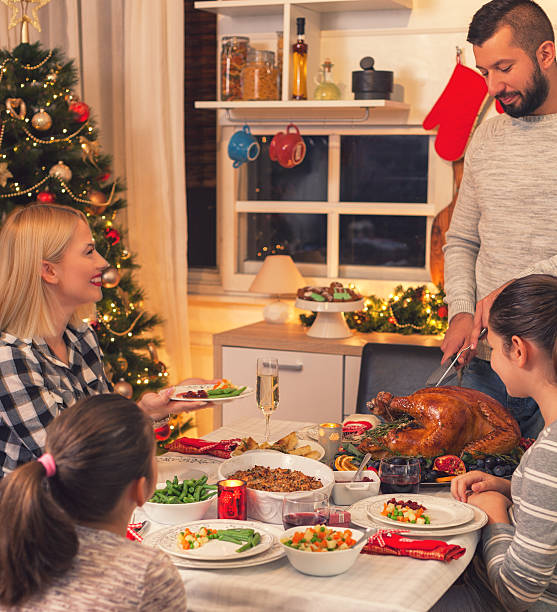 istock Carving Traditional Stuffed Turkey For Christmas 626466846