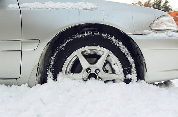 The car got stuck in the snow stock photo