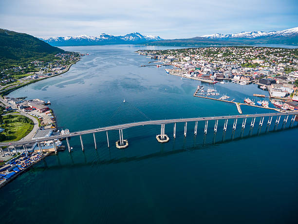 Bridge of city Tromso, Norway Bridge of city Tromso, Norway aerial photography. Tromso is considered the northernmost city in the world with a population above 50,000. tromso stock pictures, royalty-free photos & images