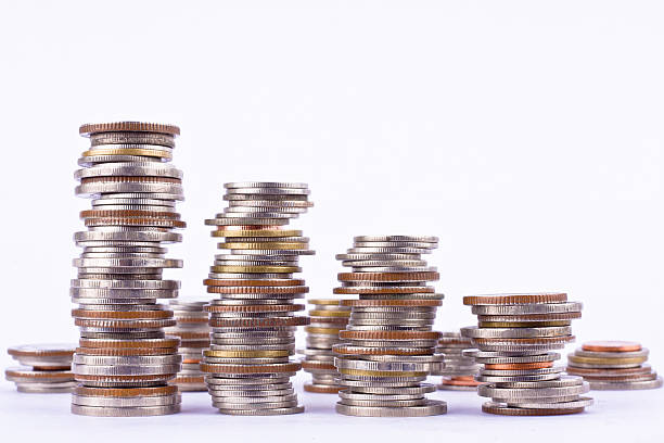 istock growing money graph on a row of coin 626467228