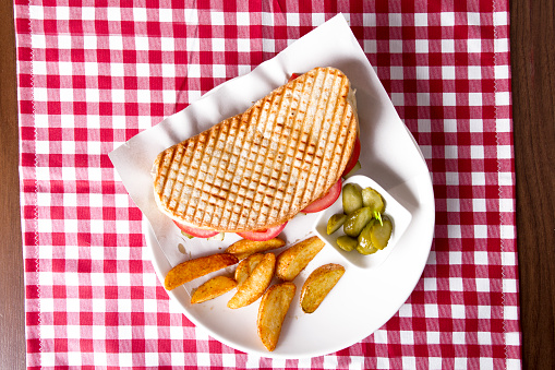 Ayvalik toast, traditional Turkish fast food from aegean town and potato wedges