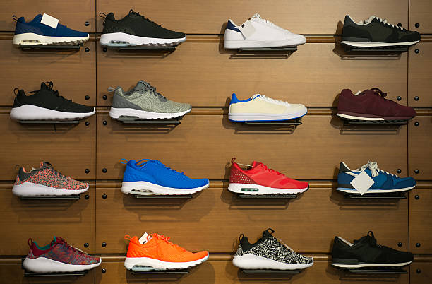 Big collection of different sport shoes.