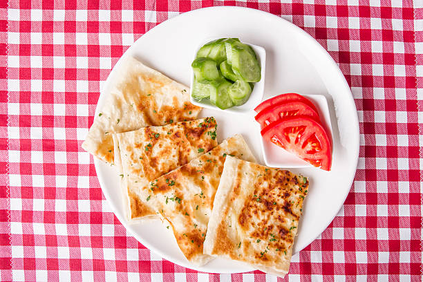 Turkish traditional Gozleme pita potatoes with cucumber