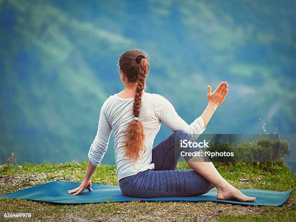 Woman Practices Yoga Asana Outdoors Stock Photo - Download Image Now - Active Lifestyle, Adult, Adults Only