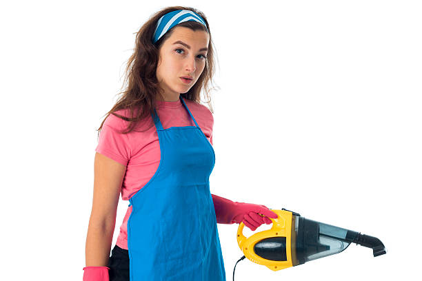 istock young maid woman with cleansers 626470016