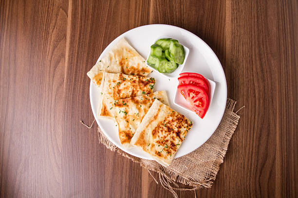 Turkish traditional Gozleme pita potatoes with cucumber