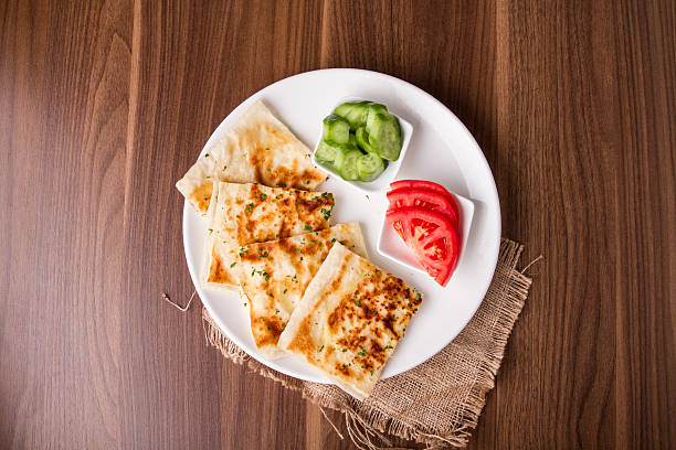 Turkish traditional Gozleme pita potatoes with cucumber