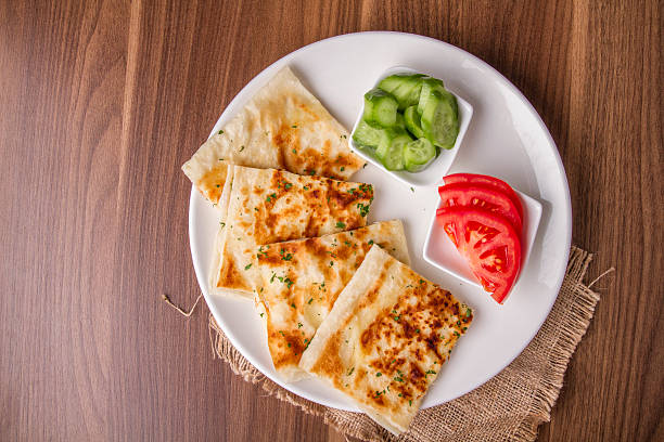 Turkish traditional Gozleme pita potatoes with cucumber