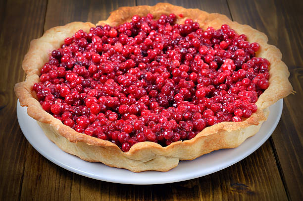 istock Cranberry pie on wooden plate 626490052