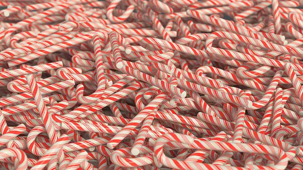 Messy pile of red and white candy canes. This image is a 3D illustration.