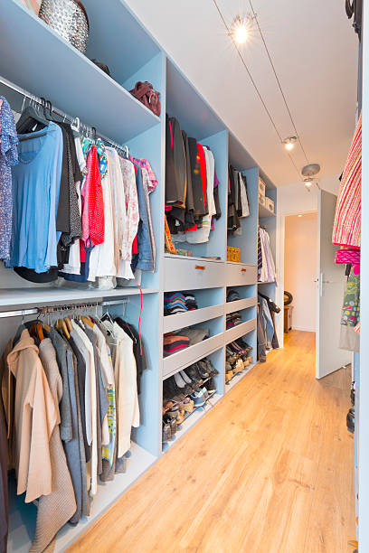 istock Big beautiful walk in wardrobe. Luxury modern home 626500688