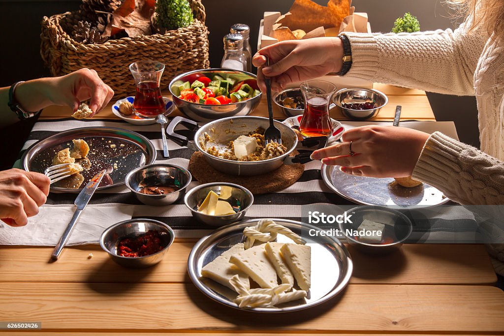 Two Young Beautiful Woman having breakfast in the morning Two Young Beautiful Woman having breakfast in the morning at a restaurant in turkey Breakfast Stock Photo