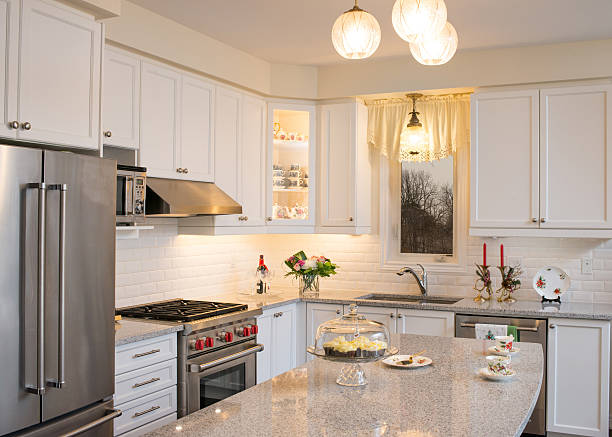istock New white kitchen with Christmas decorations 626503996