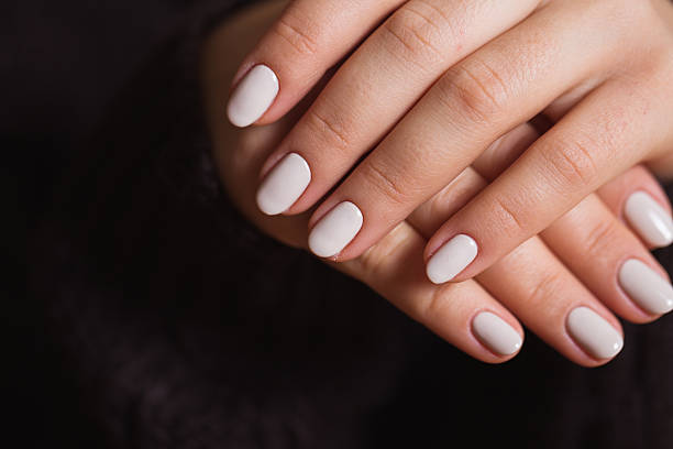 istock Beautiful woman nails with a beautiful bright manicure 626510802
