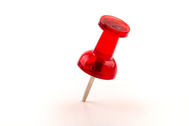 istock Red Push Pin isolated on white background. 626512386