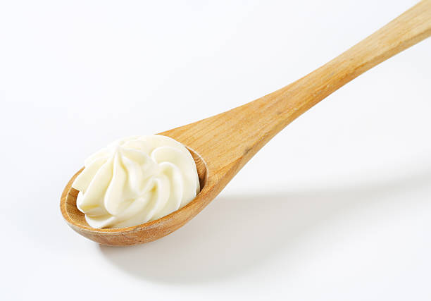 istock Cheese spread on wooden spoon 626513902