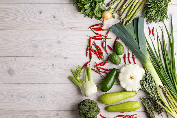 istock Vegetables of different kinds are lying on a wooden table 626515150