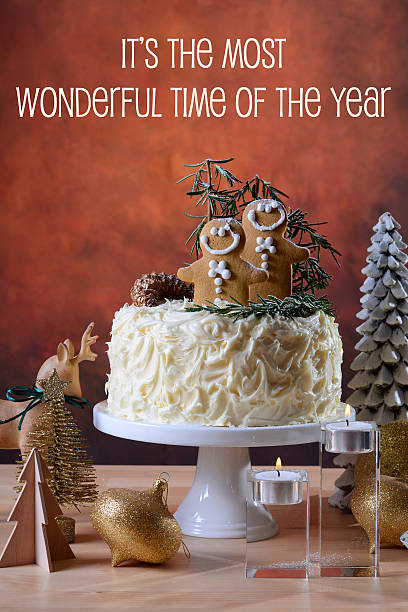 istock Festive Christmas white chocolate cake with gingerbread men cook 626515518