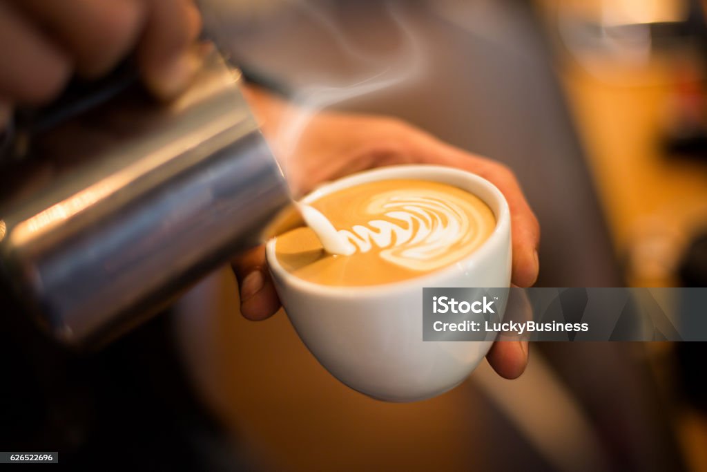 Making of cafe latte art Making of cafe latte art leaf shape Coffee - Drink Stock Photo