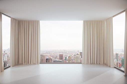 Empty concrete interior with curtains and city view. 3D Rendering