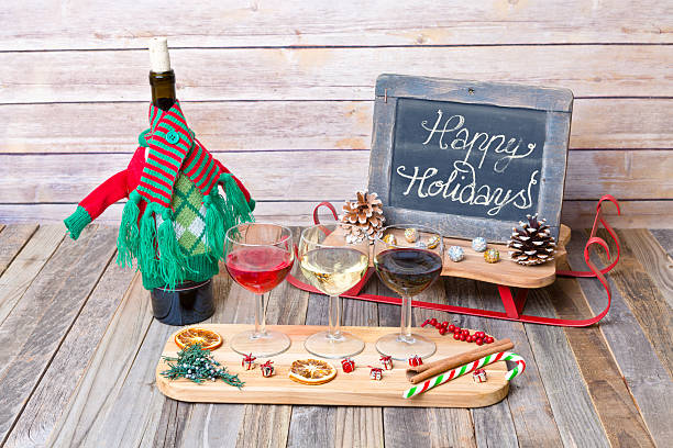 istock Holiday wine flight with chalkboard sign and decorations 626524120