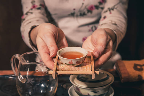 tea ceremony is performed by master stock photo