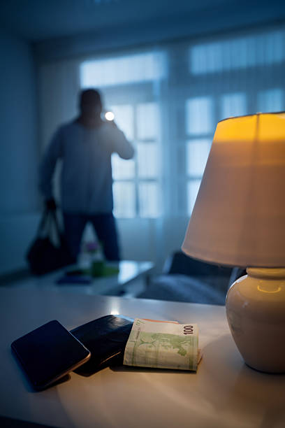 istock burglary or thief in a house 626536462