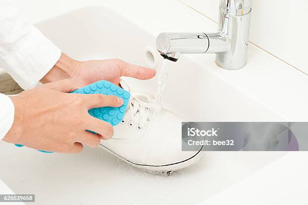 Wash Shoes Stock Photo - Download Image Now - Cleaning, Horizontal, Human Body Part