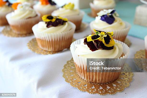 Tropical Vanilla Cupcakes Stock Photo - Download Image Now - Edible Flower, No People, Sweet Food
